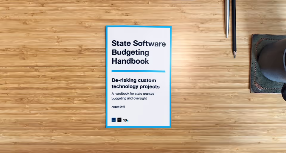 Cover the print version of the state guide on a desk